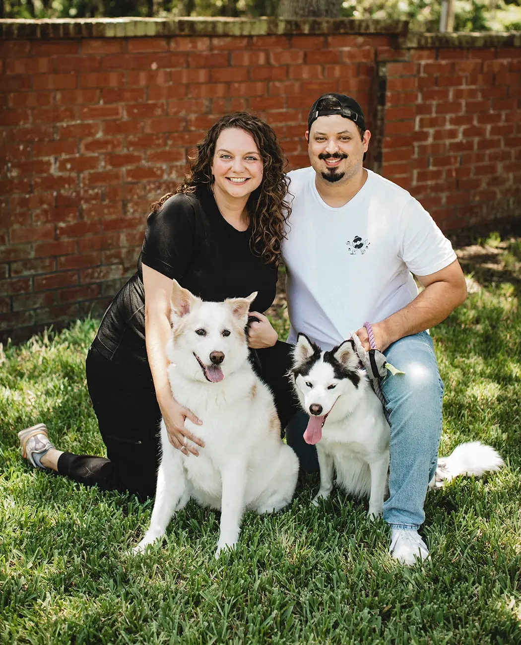 Dr. Drolet with her husband and two dogs